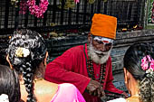 Worship and puja offerings inside the Swamimalai temple. 